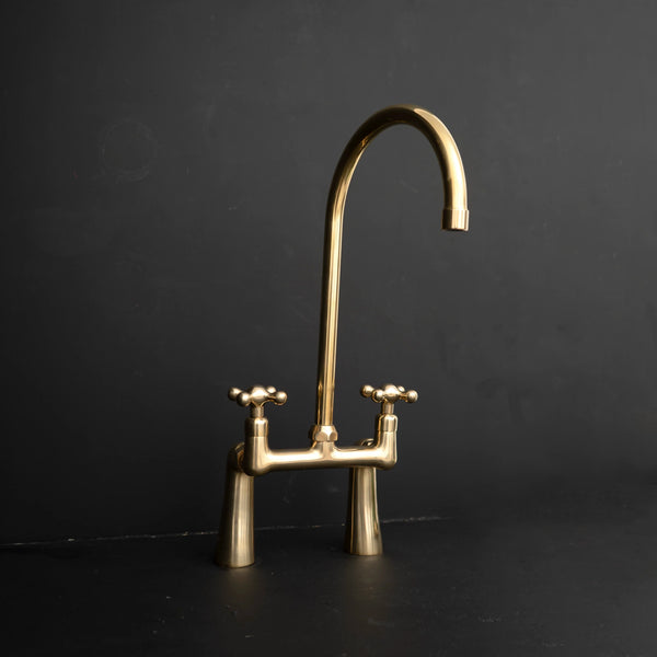 Prestige unlacquered brass bridge kitchen faucet – refined silhouette, front view