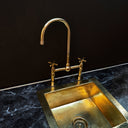 Polished brass bridge faucet handle and bridge detail close-up – Brass For Homes
