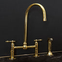 Unlacquered brass bridge faucet lever handles – side view with natural patina