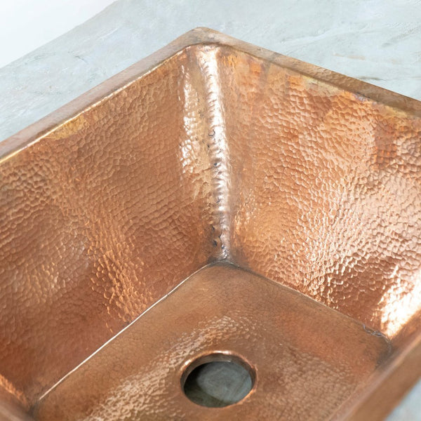 Handcrafted undermount hammered copper kitchen sink – artisan-made, front view