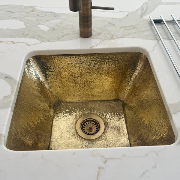 Handcrafted unlacquered brass kitchen sink – hammered undermount, front view