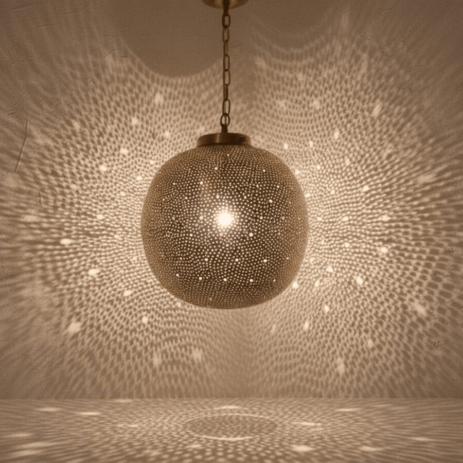Brass globe pendant light with pierced Moroccan pattern in boho interior – Brass For Homes