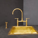 Mykonos brass bridge faucet – close-up of spout and handle