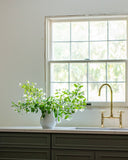 Malmo brass bridge faucet – installed in modern farmhouse kitchen